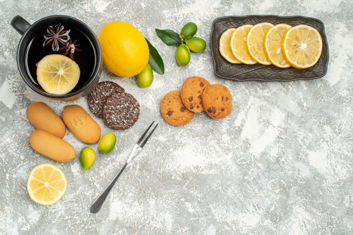 水果顶视图甜点一杯茶柠檬饼干柑橘水果切片柠檬叉农产品健康柑橘