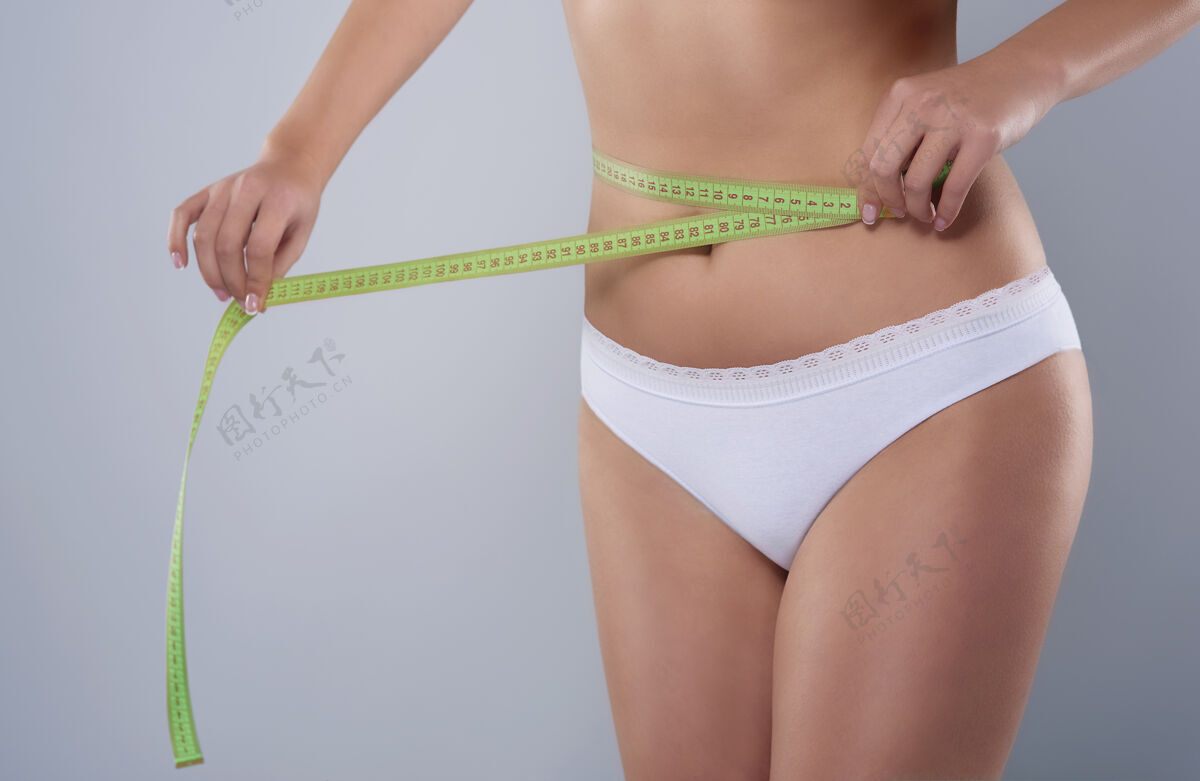 一个人女人腰围的一部分测量身体完美
