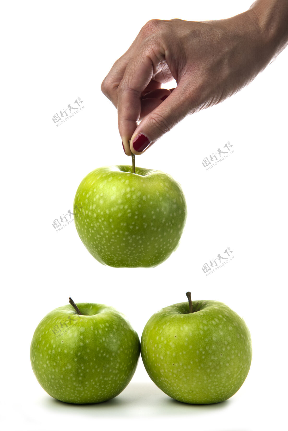 水果女人手里拿着白苹果上的青苹果绿色有机成熟